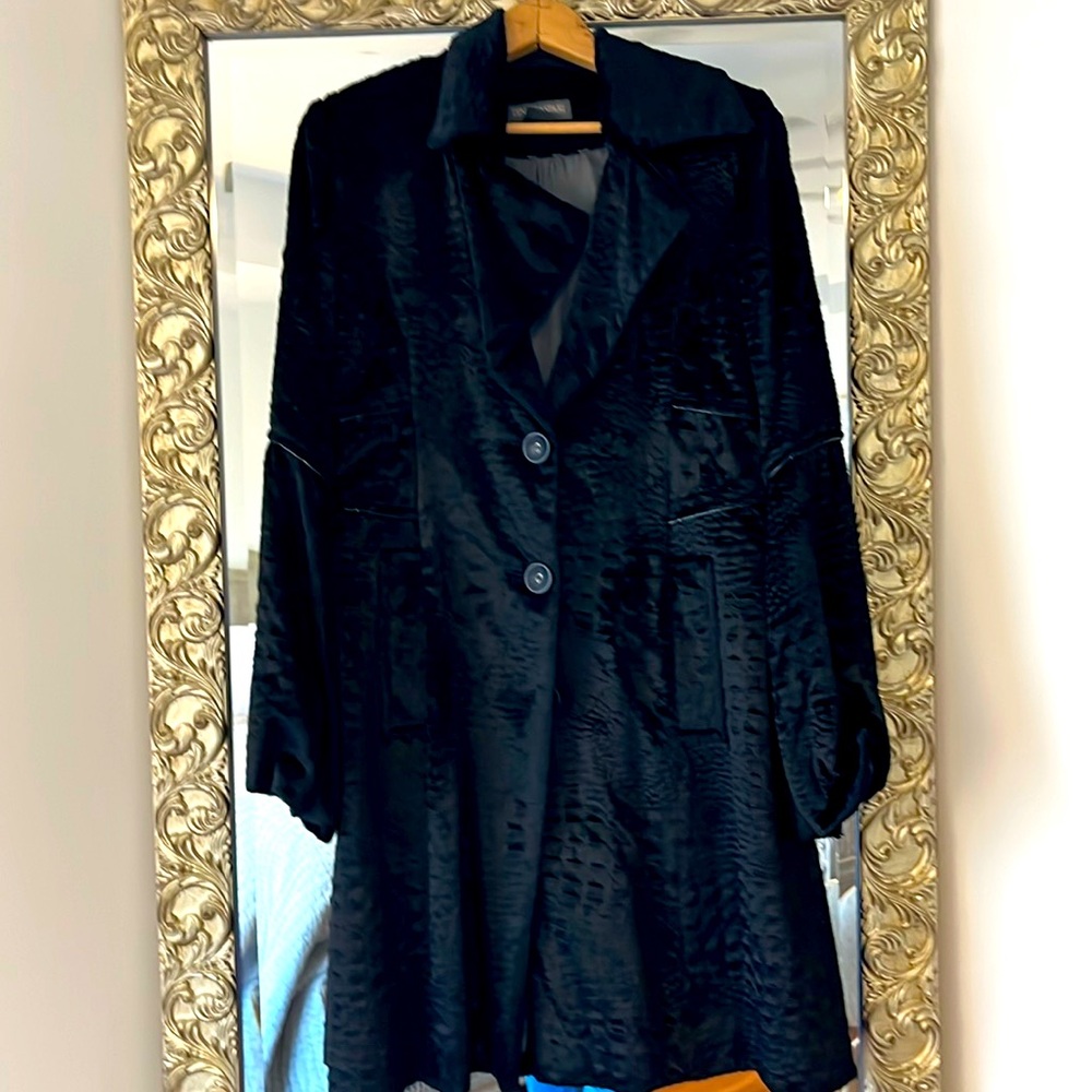 Persian wool with leather trim coat